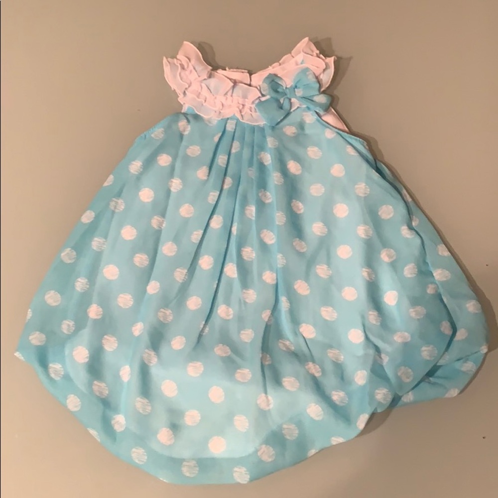 Polyester aqua onesie/jumper with polka dots